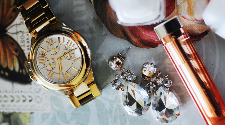 An overview of a watch and jewelry shows why you need the proper insurance to protect your high-value items.