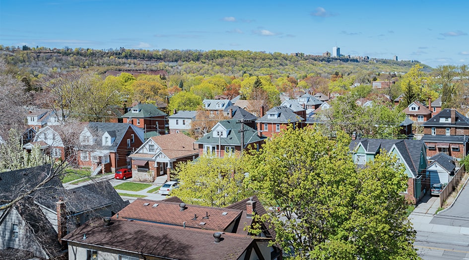 An aerial shot of an older neighbourhood shows one of the reasons why the cost of your home insurance went up at renewal