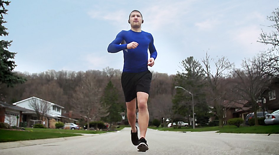 Person jogging down the street