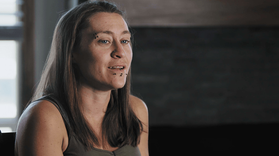 Jaci sits in her living room and shares how her insurance claim restored her home after a chimney fire.